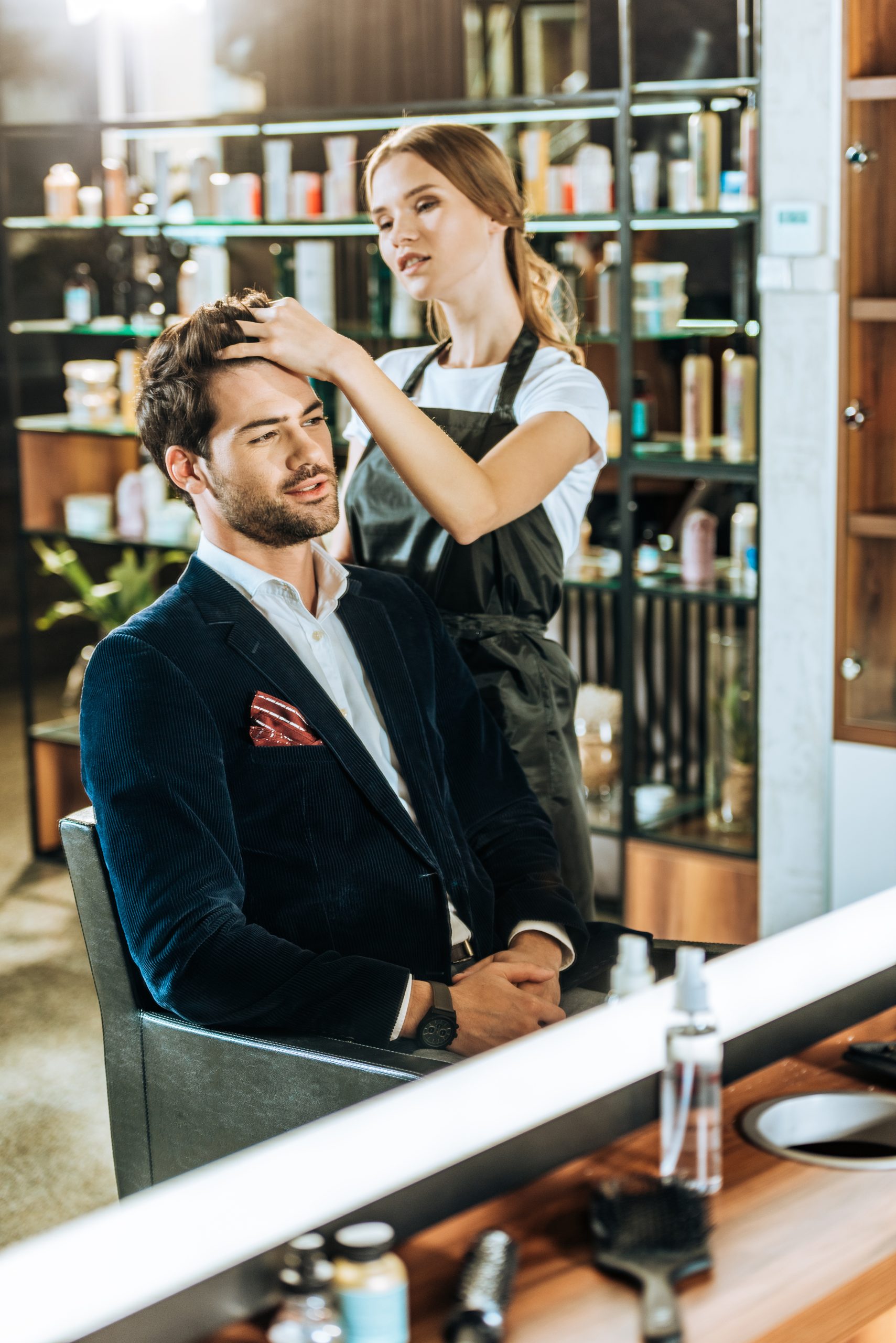 a gentlemen groomed by a hairdresser